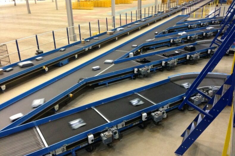 Belt conveyor systems transporting parcels at Hermes warehouse
